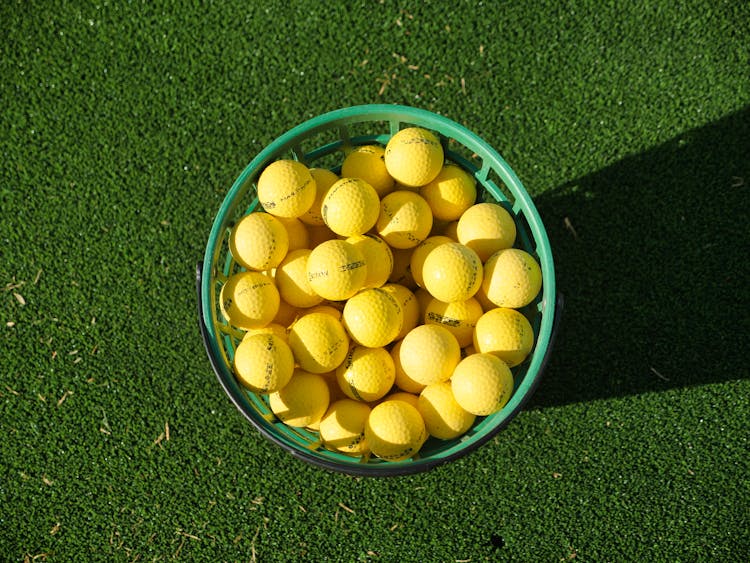 Yellow Golf Balls In A Basket