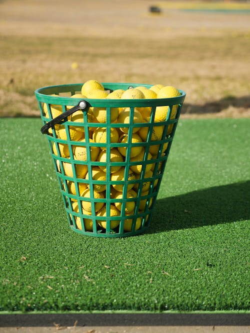 A Basket of Yellow Golf Balls