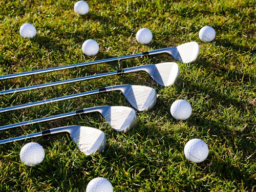 Free Five Golf Clubs and Golf Balls Stock Photo