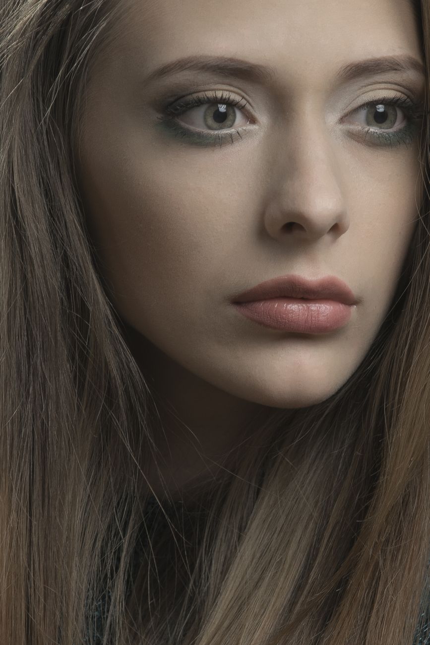 Intimate close-up portrait of a woman with captivating eyes in Kyiv, Ukraine.