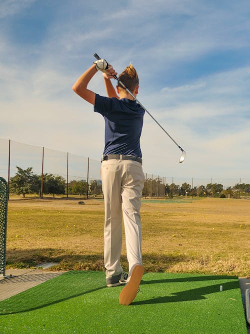Photo of a Person Playing Golf