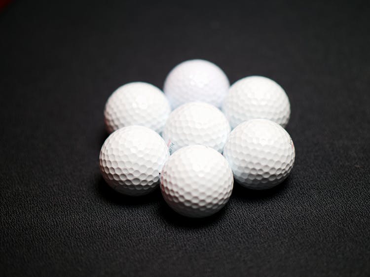 Set Of Golf Balls On Black Background