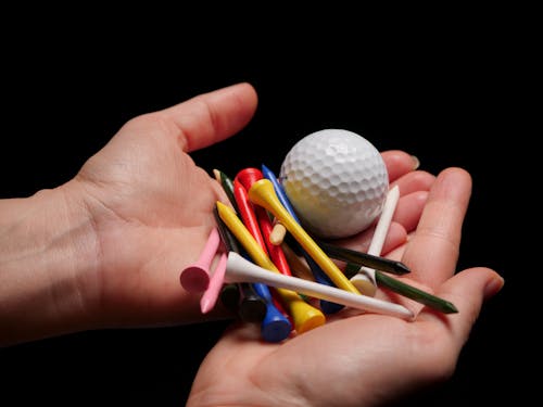 Kostnadsfri bild av golf tee, golfboll, håller