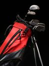 A Red and Black Caddy Bag with Club Set