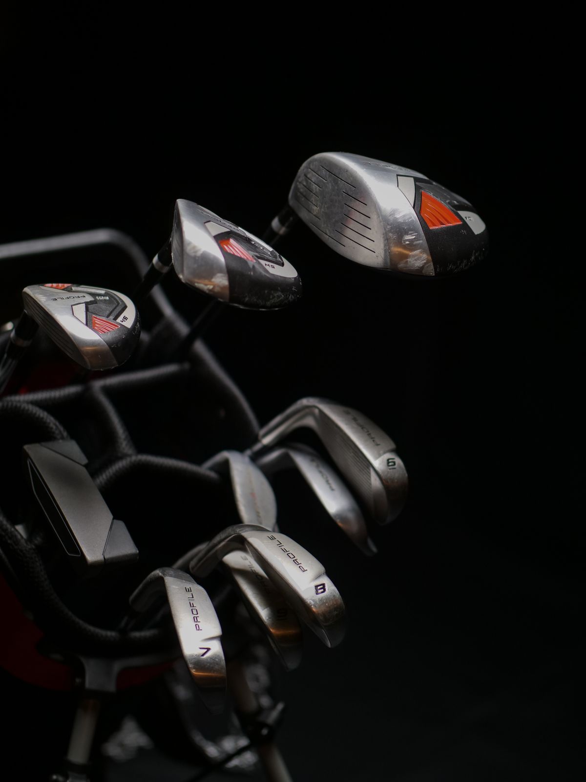 Detailed view of a set of golf clubs