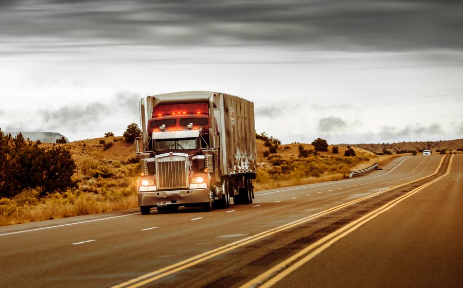 Truck on desert highway in Nevada