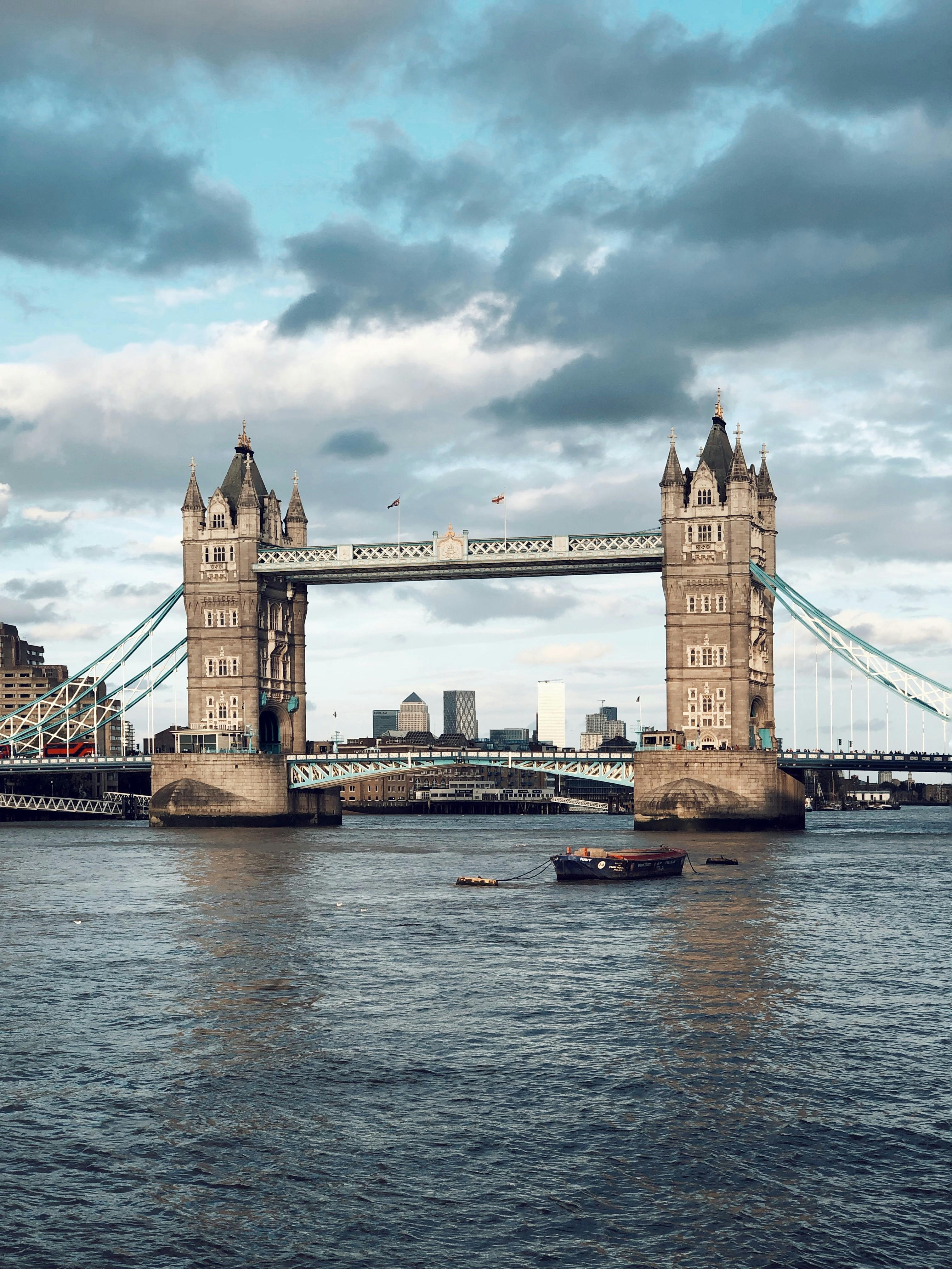 Group Of People Walking On Bridge · Free Stock Photo