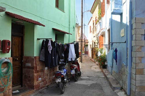 Narrow Street in a Town with Hanging Laundry