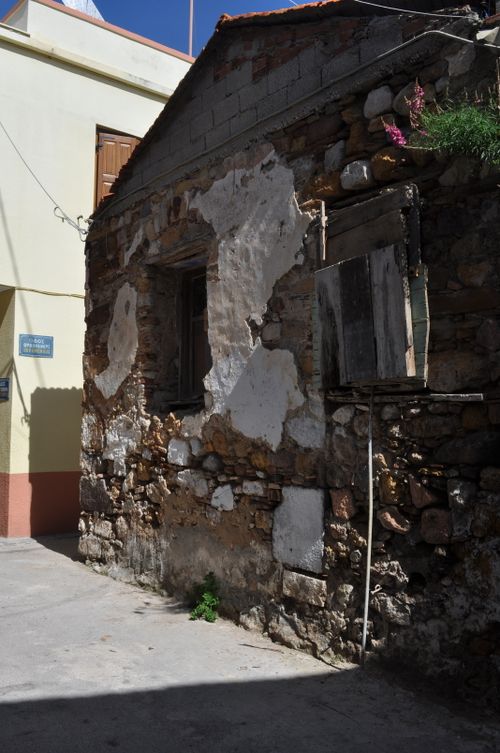 Free Weathered stone building in Chios, Greece under bright sunlight. Stock Photo