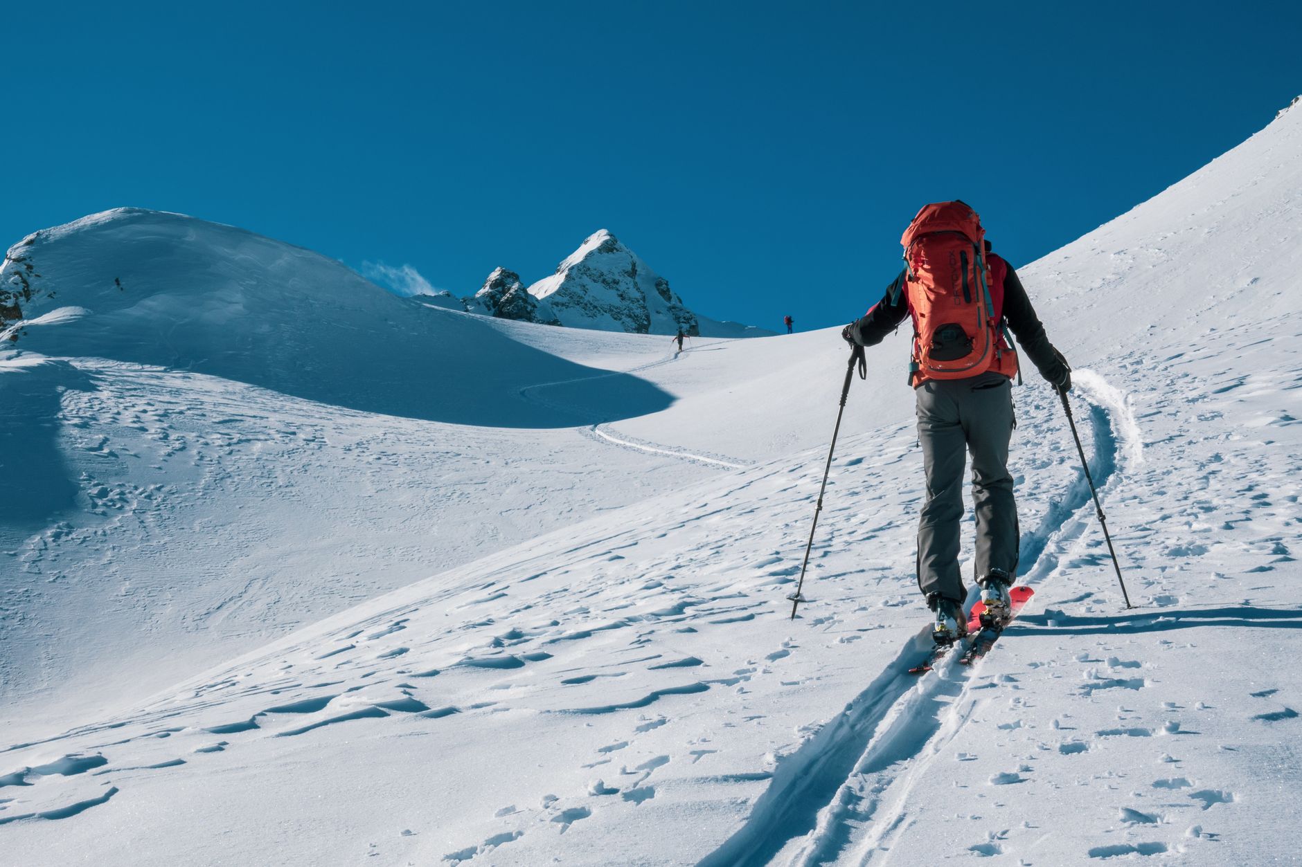 mountaineer climbing alpine snow
