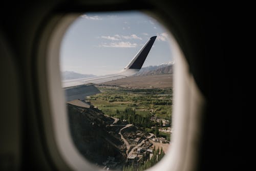 Fotobanka s bezplatnými fotkami na tému cestovanie, krídlo lietadla, okno