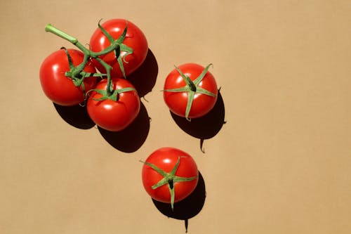 Cherry Tomatoes on Beige Background