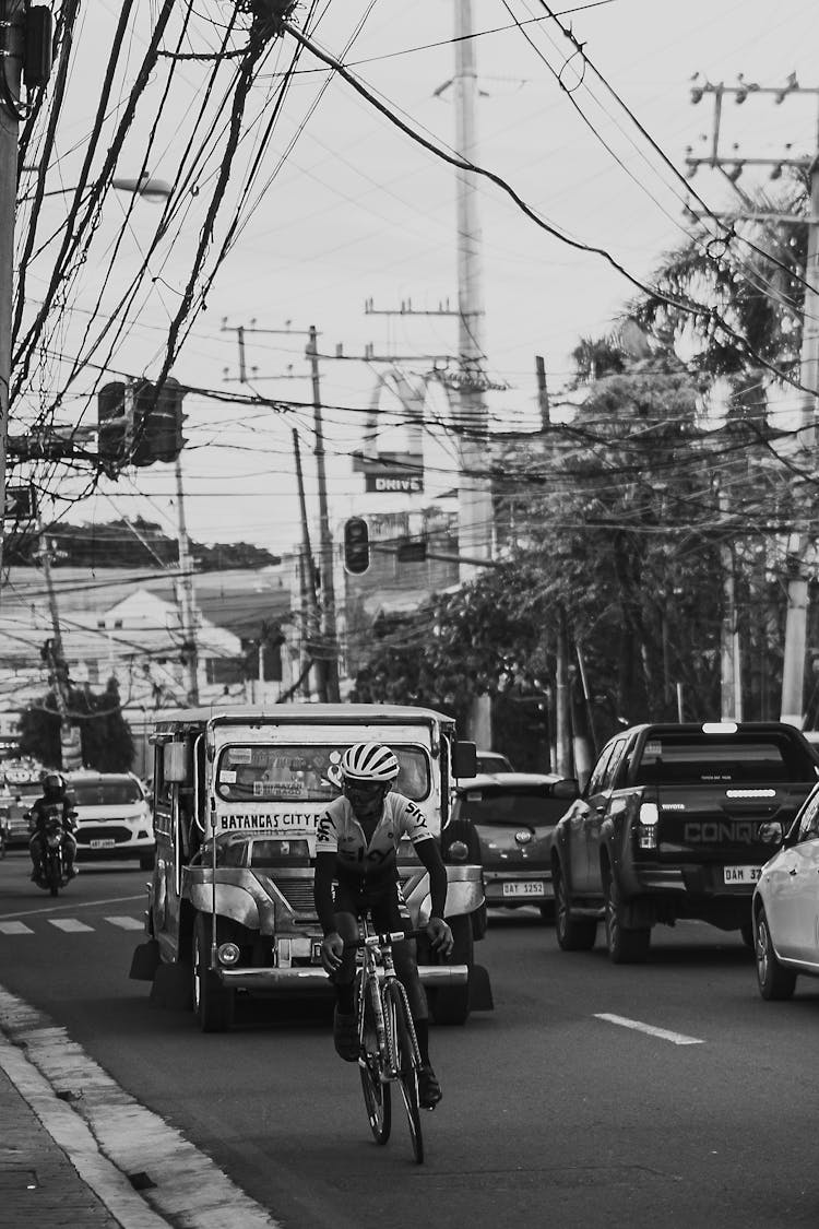 Road With Cars And Bike In City