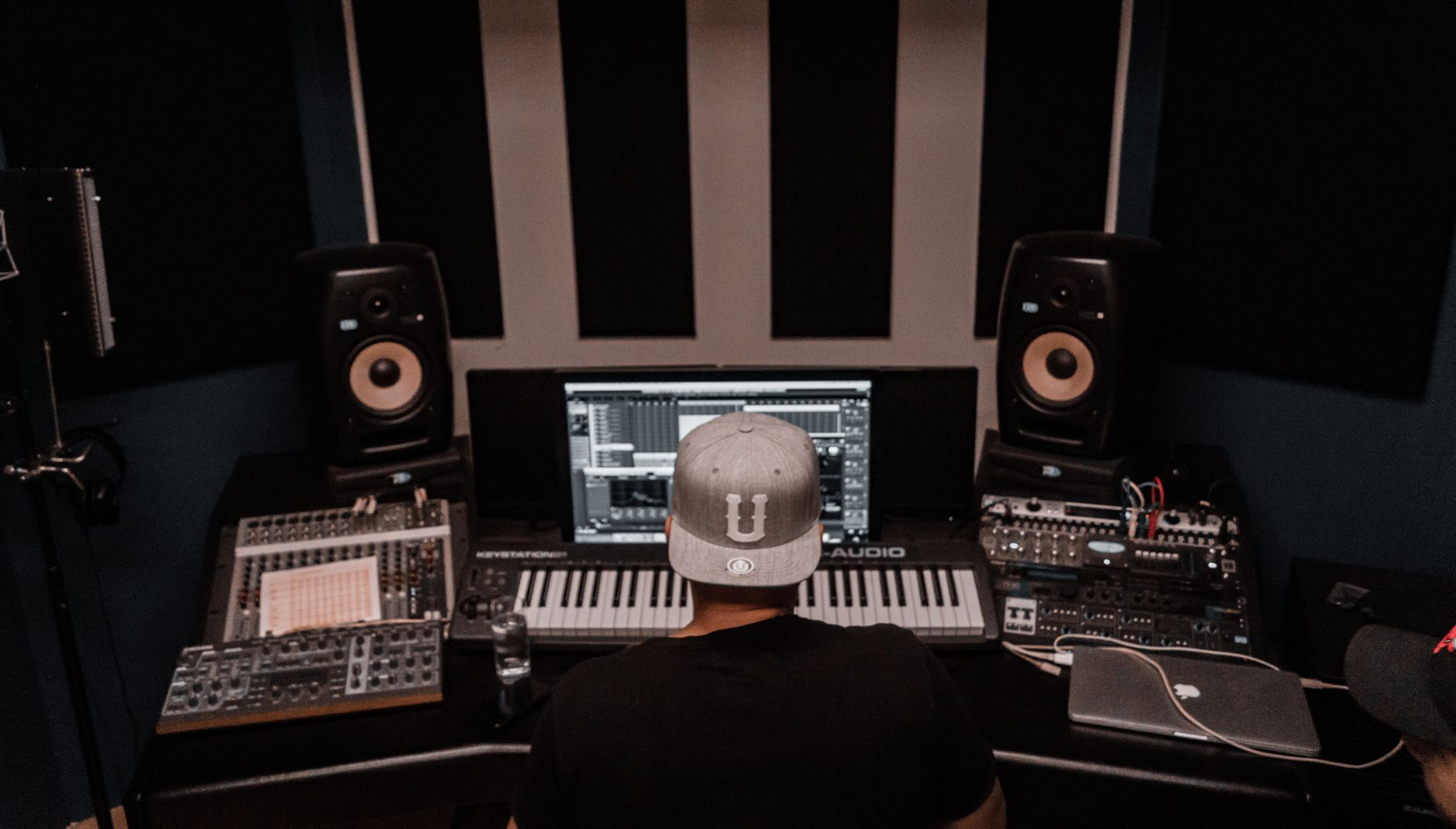 DAW session with guitar loop and trap drums for emo rap