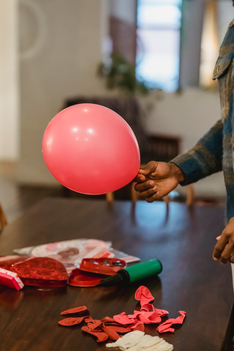 Black Male With Red Balloon For Party