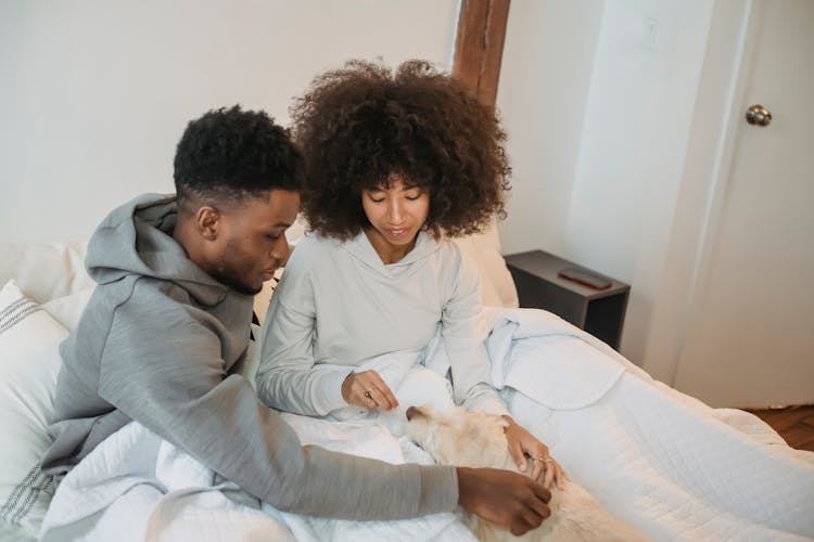 Gentle Black Couple Having Carefree Morning With Pet