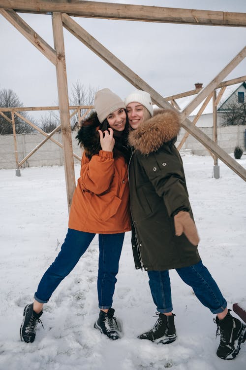 Happy Young Girl with Winter Snow Clothes Playing, Real Life Stock