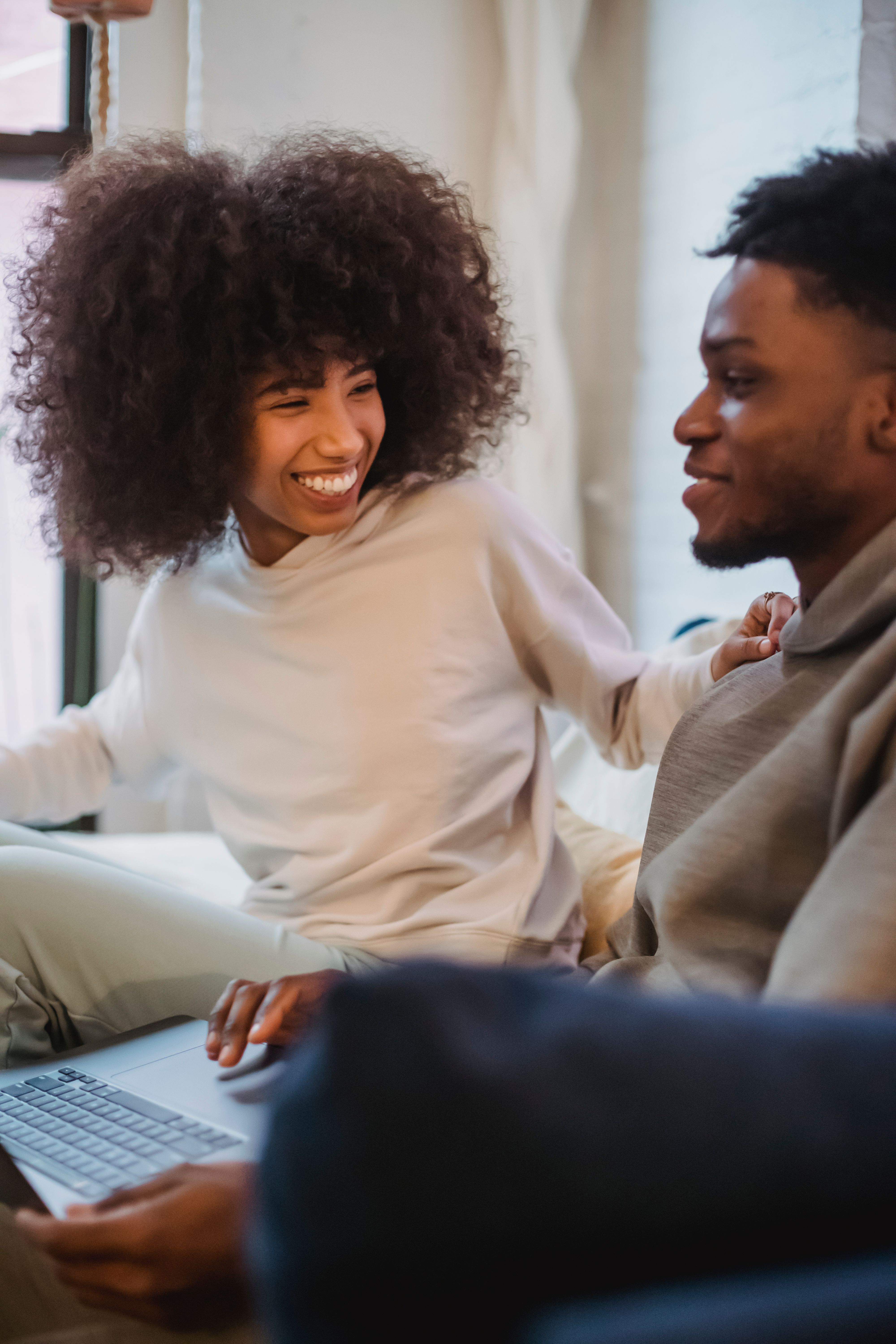 cameroon dating app – couple laughing during video chat