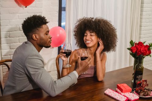African American couple talking while having date at table · Free Stock ...