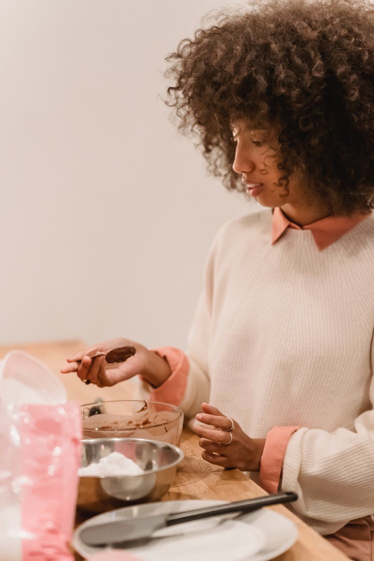 Black Woman Preparing Batter For Pastry