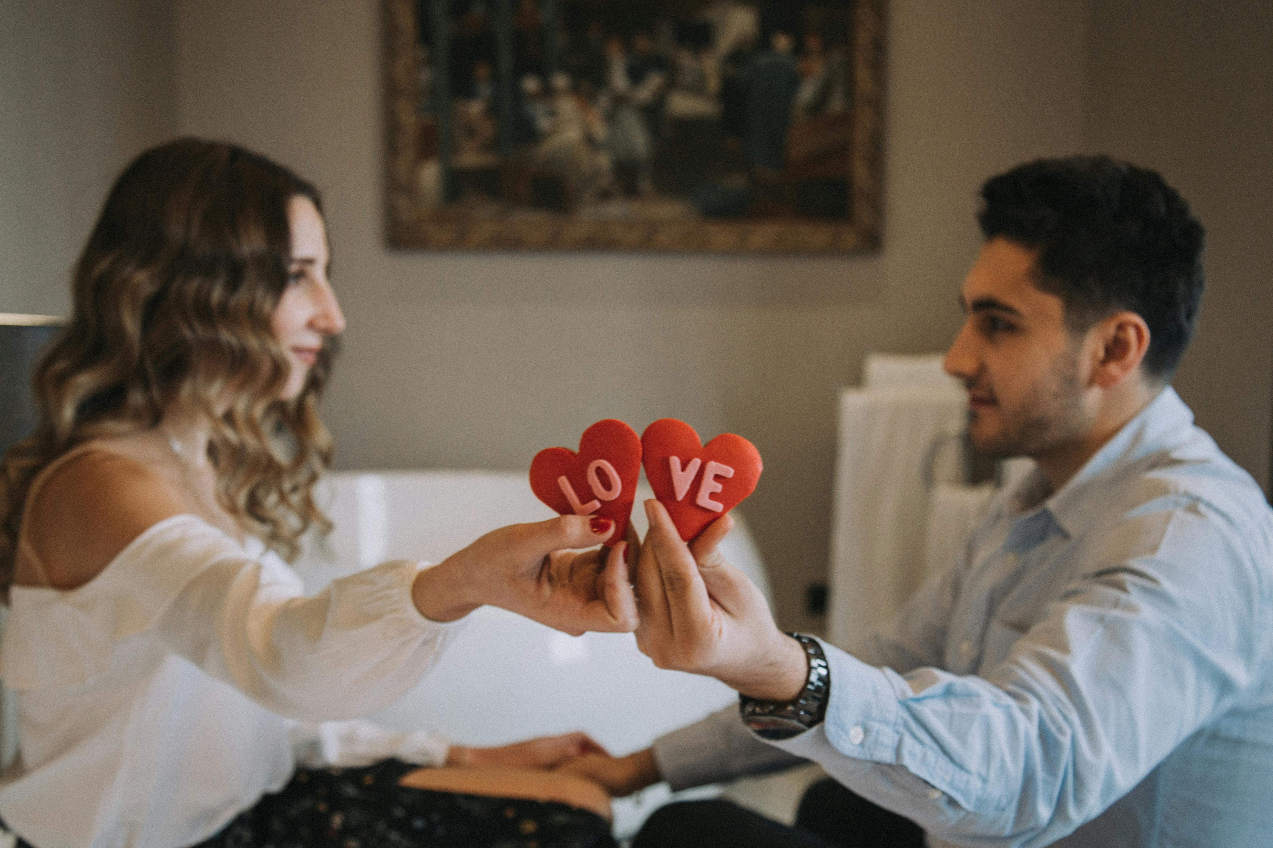 man and woman holding each others hand