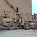 Empty Bulldozer in a City