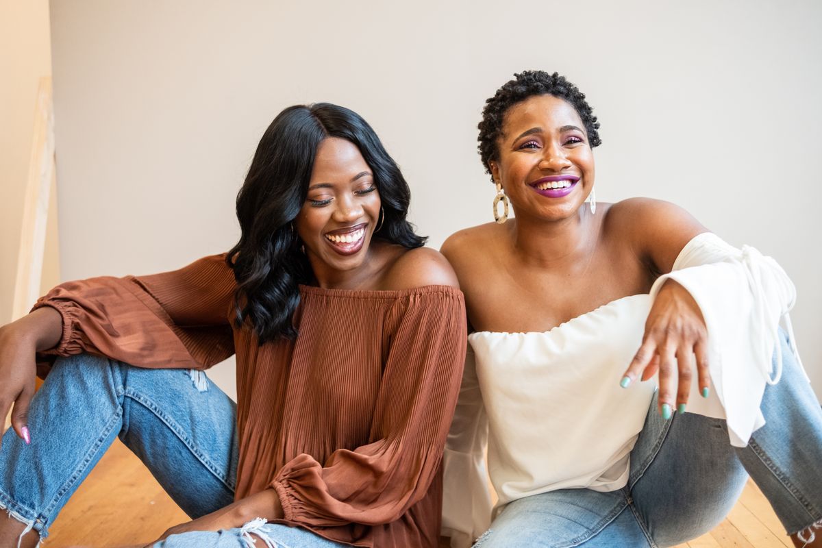 Two women laughing and enjoying each other’s company