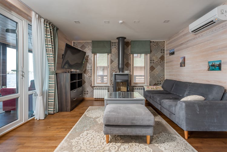 Interior Of Spacious Living Room In Country Style