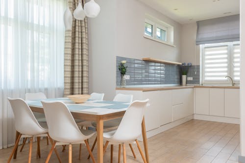 Stylish dining room in beige tones