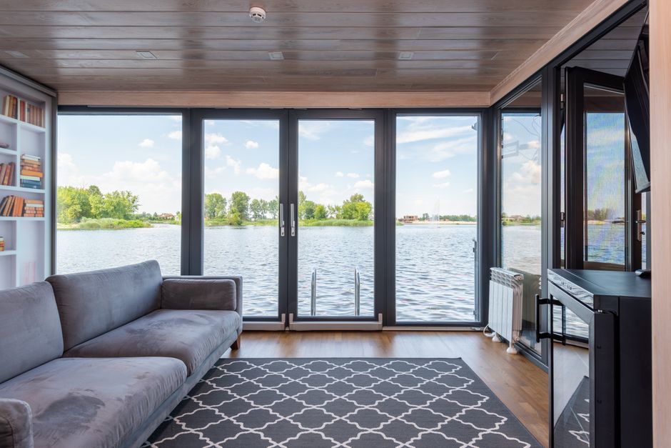 modern home with floor-to-ceiling picture windows modern home with floor-to-ceiling picture windows