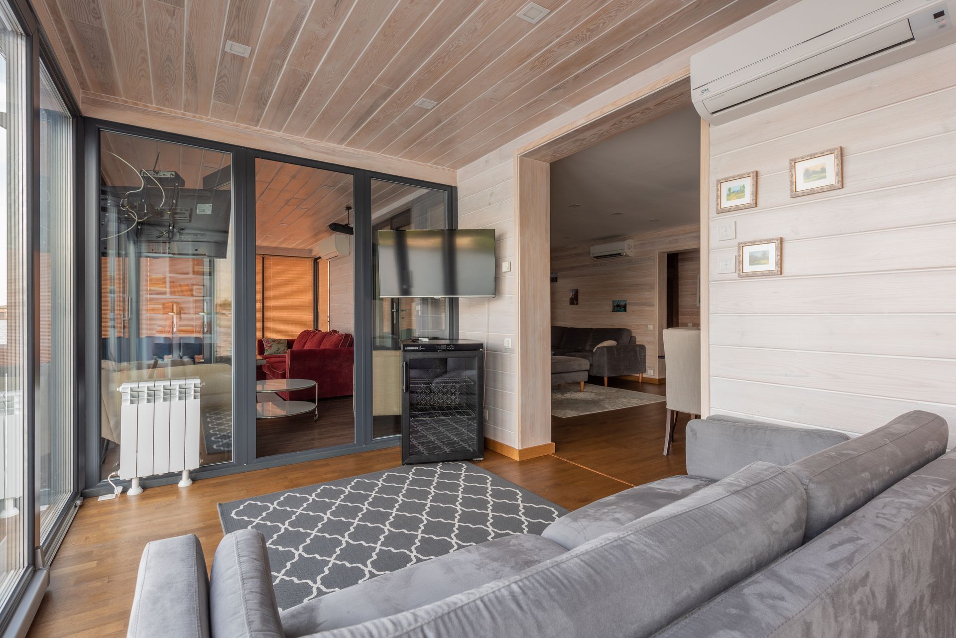 A modern room with a timber ceiling