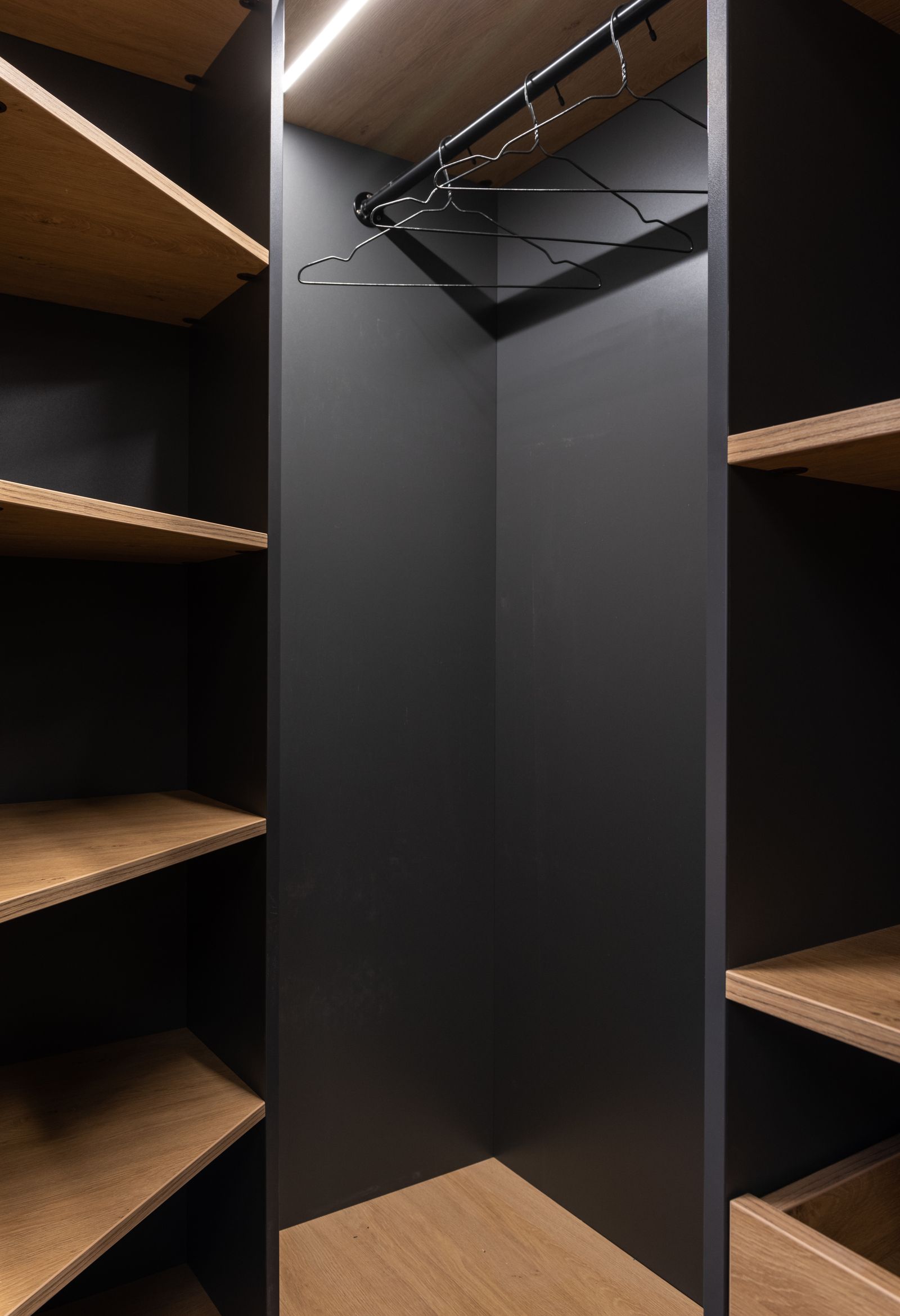 Modern wardrobe storage designed for an apartment bedroom