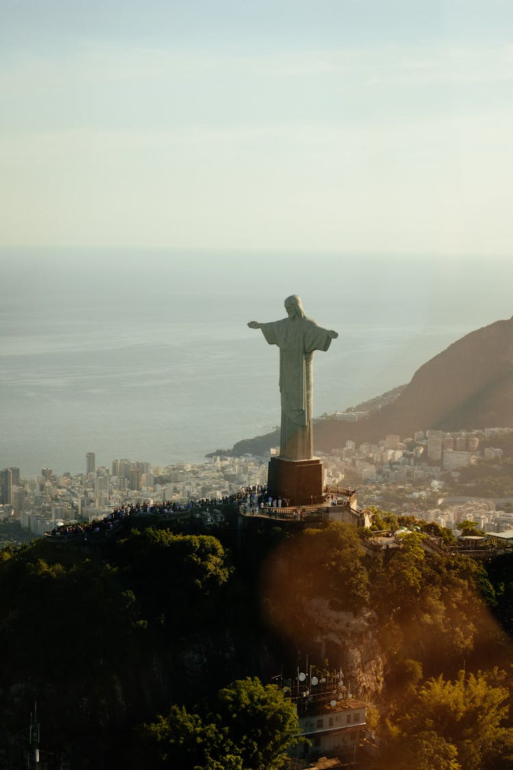 Statue Of Jesus Christ On Mount In Evening