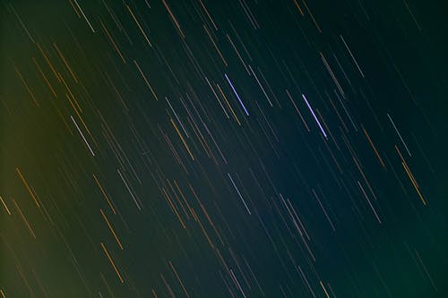 Foto profissional grátis de astronomia, céu bonito, estrelas cadentes