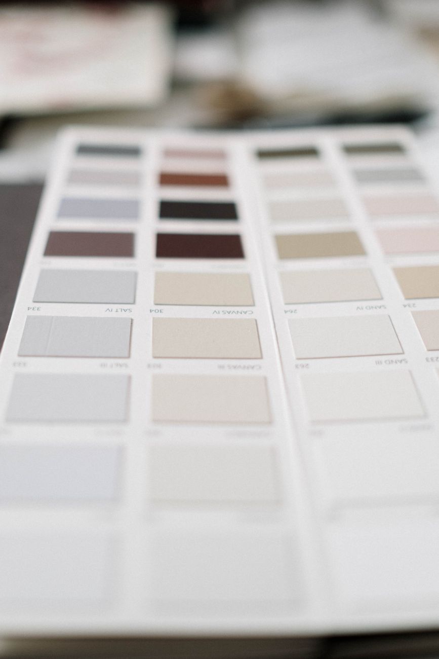 Close-up of a neutral color palette sample sheet showcasing various swatches in soft tones.. pexels, close, neutral
