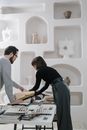 Man and Woman Sorting Samples on a Table