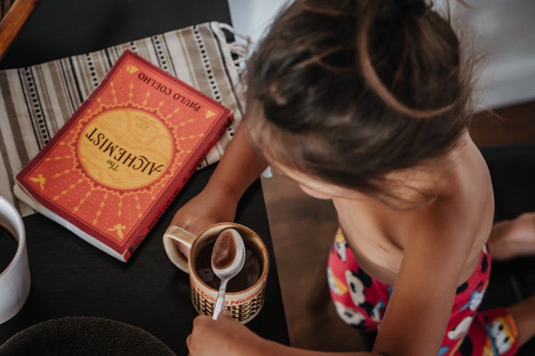 A Girl Drinking Hot Chocolate