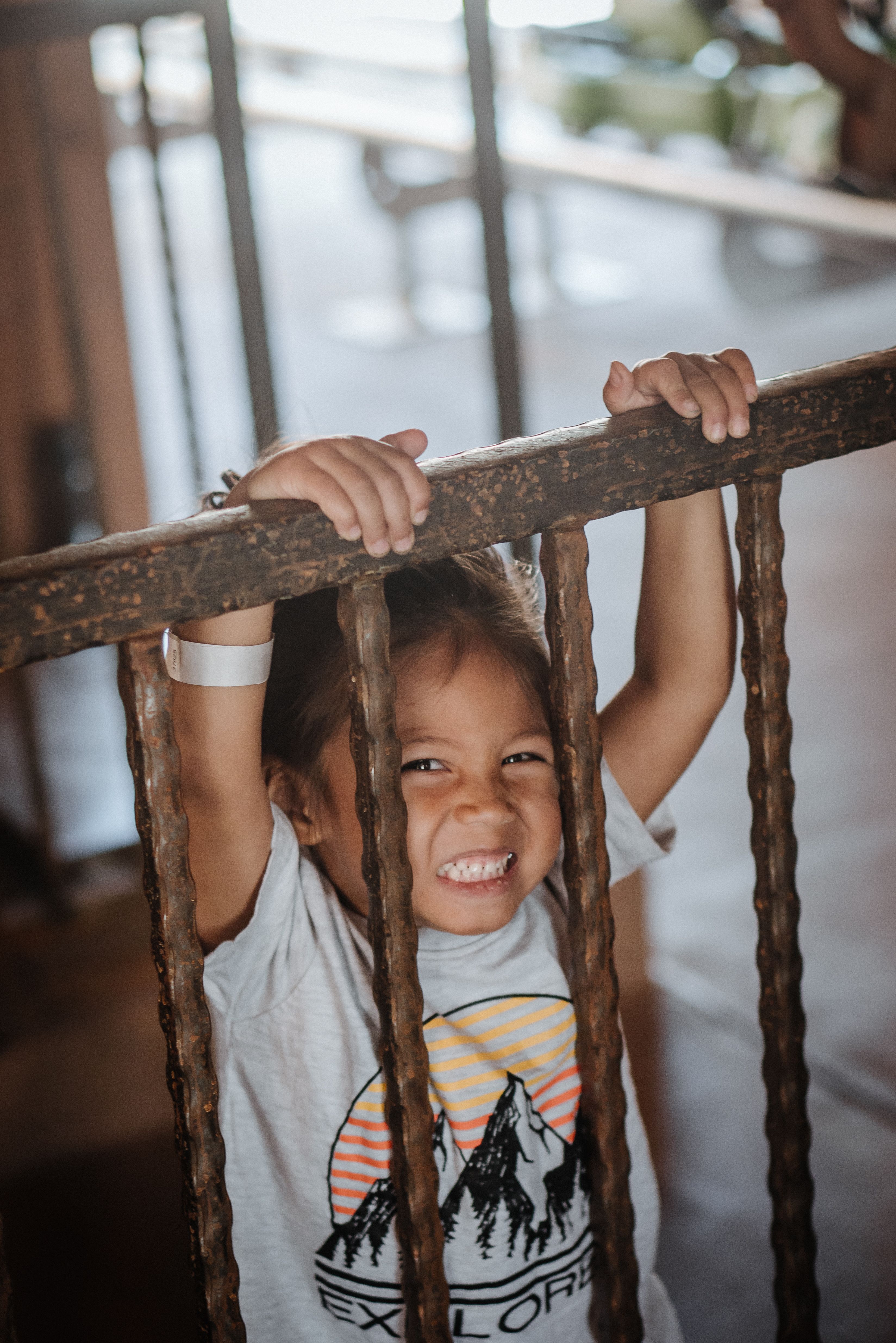 Girl Holding on to Railing · Free Stock Photo