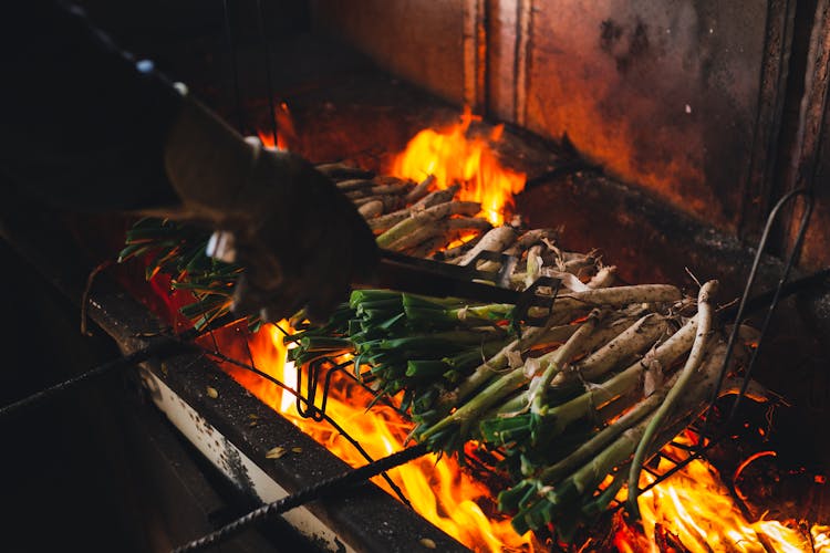 Green And Brown Vegetable On Fire