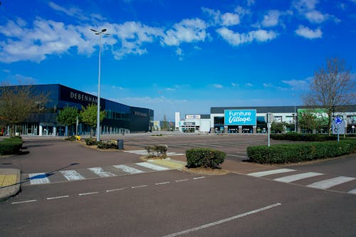 View of Parking Space Before Large Shopping Centres