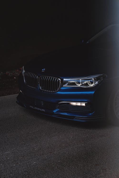 Blue Car Parked on the Road