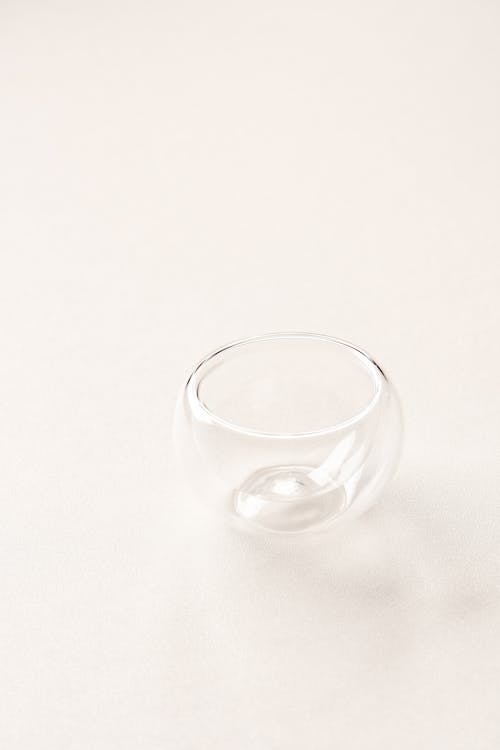 Clear Drinking Glass on White Surface