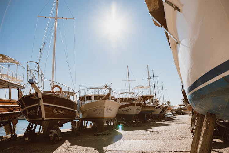 Sunlight Over Fishing Boats In Harbor