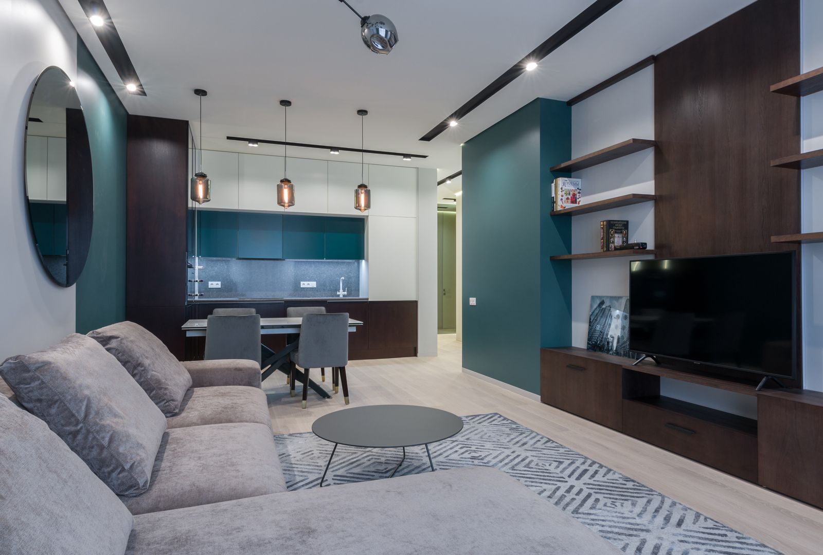 Studio residence with kitchen, dining, and living zones in one open plan