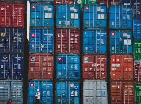 Colorful stacked cargo containers at a shipping yard in Jakarta, Indonesia.