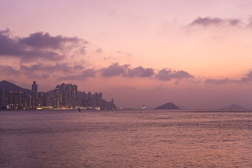 Sea with City in the Distance at Dusk 