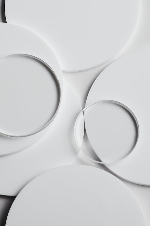 Petri Dishes on White Surface