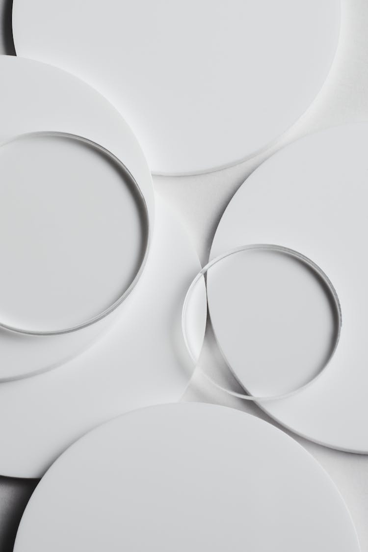 Petri Dishes On White Surface