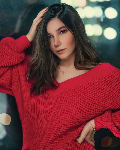 A Woman Wearing a red Sweater