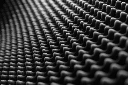 Close-up of textured acoustic foam in black and white — photo by Guillaume Meurice on Pexels